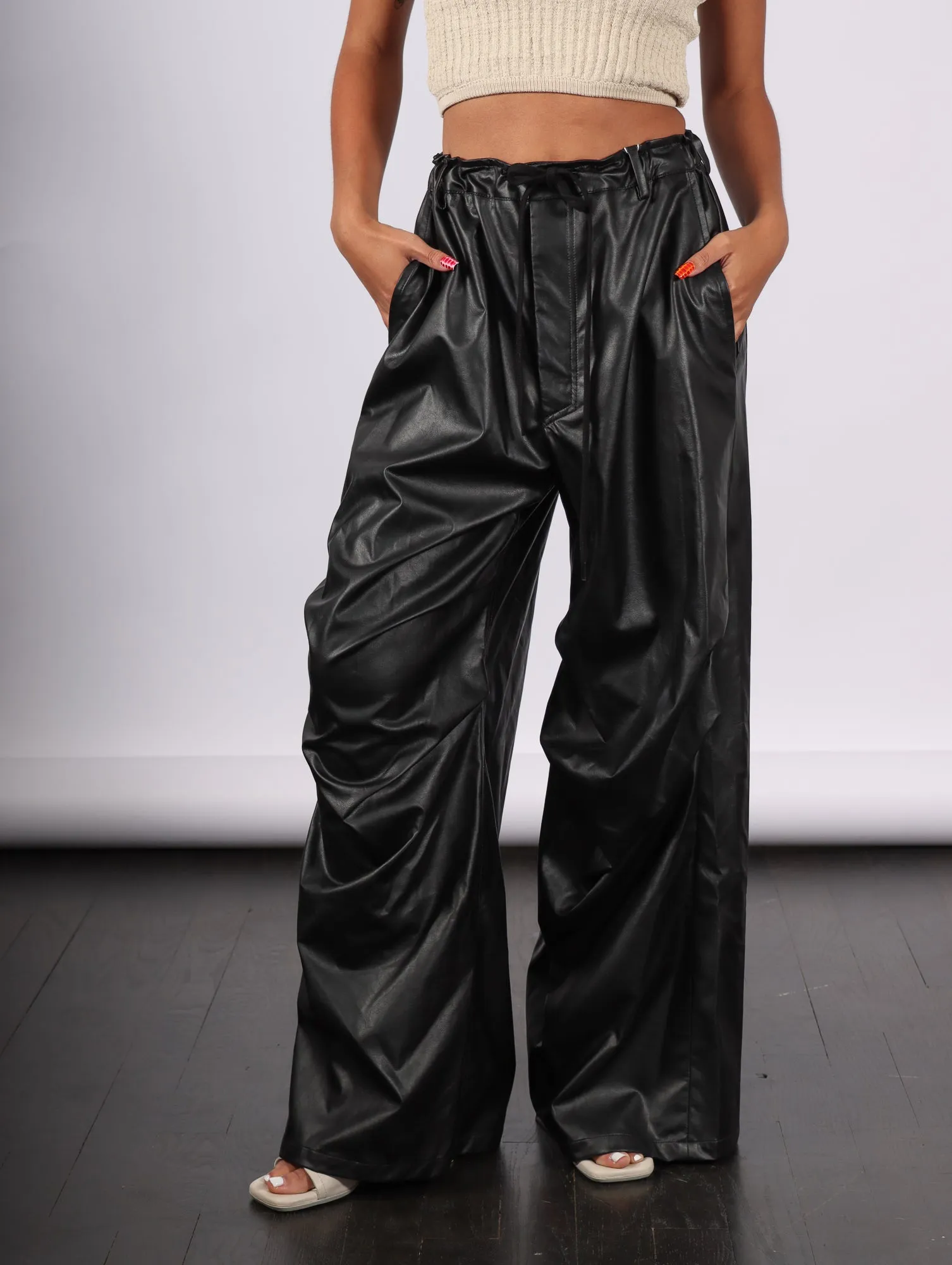 Pants in Black Faux Leather by MM6 Maison Margiela